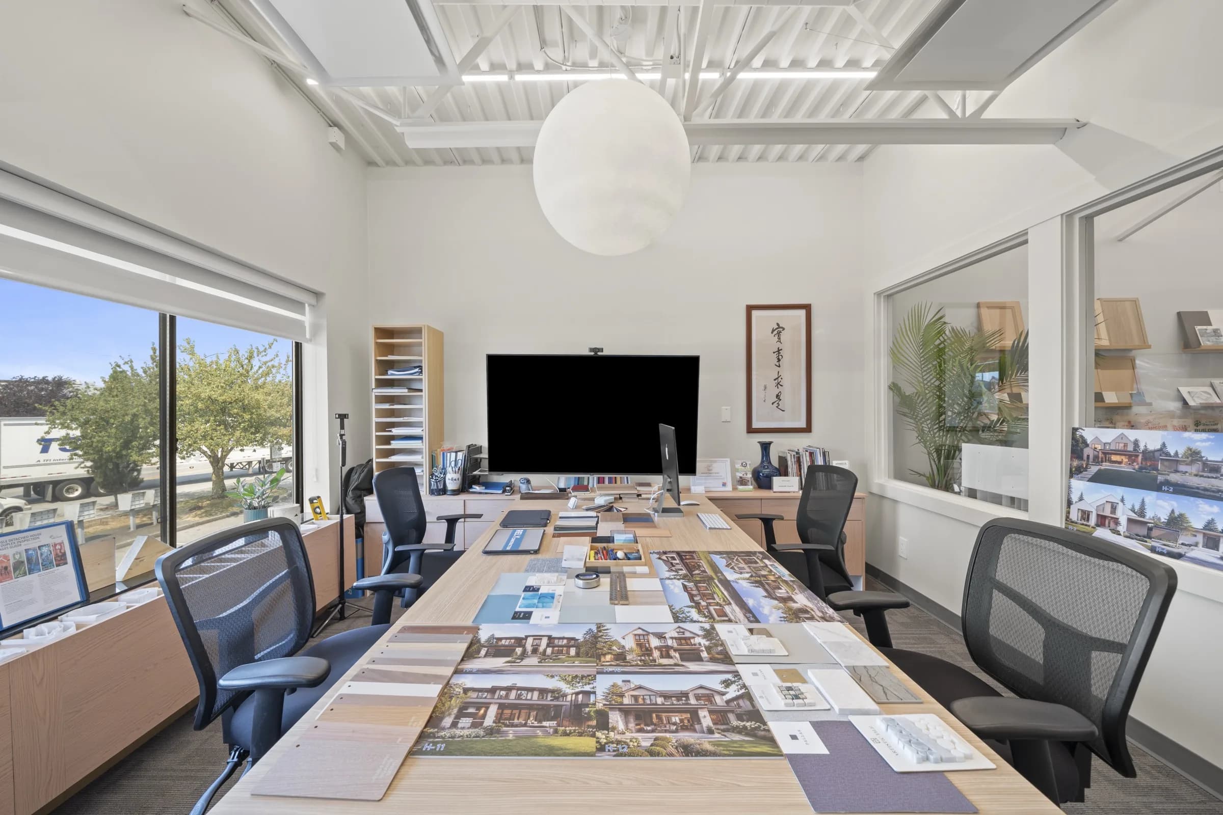Finish samples laid out on the studio selection table