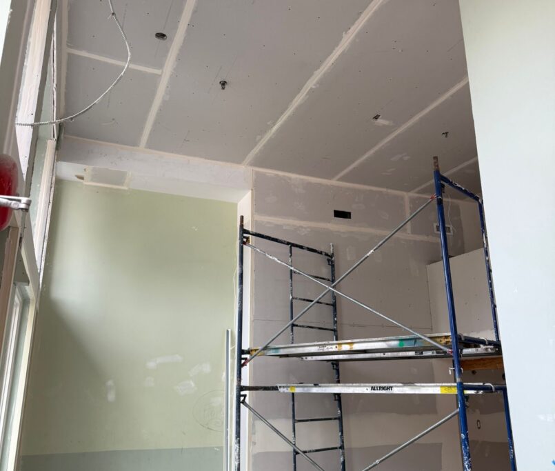 rely construction commercial projects 3696 West 8th Ave Particles Coffee Shop mid construction 19